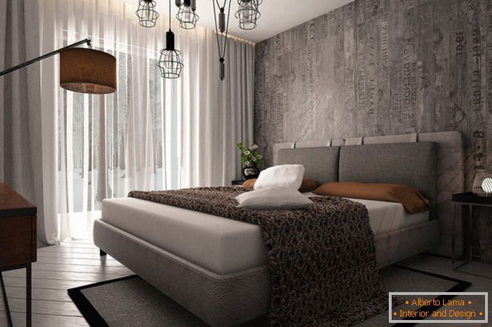 Um exemplo de iluminação bem escolhida para um quarto em estilo loft.