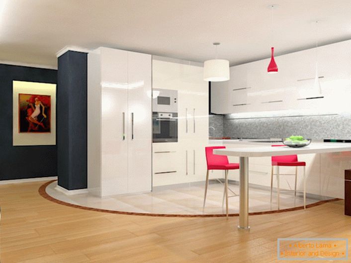 Uma cozinha espaçosa no estilo do minimalismo com um conjunto lacônico de cozinha. Simplicidade, praticidade e funcionalidade são tecidas em um único conceito de estilo.