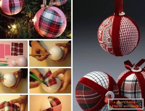 Artigo à mão elegante - uma bola de Natal feita de tecido e fitas