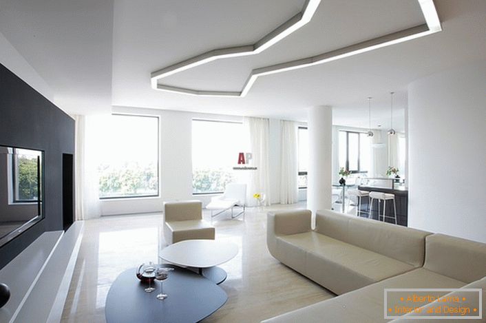 Um exemplo da seleção correta de iluminação para a sala de estar no estilo do minimalismo. De acordo com os requisitos de estilo na criação de formas geométricas interiores e linhas estritas são usadas.