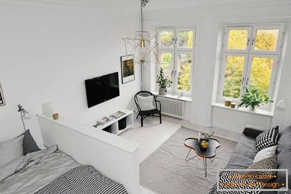 Apartamento de um quarto em estilo escandinavo - sala de estar e quarto