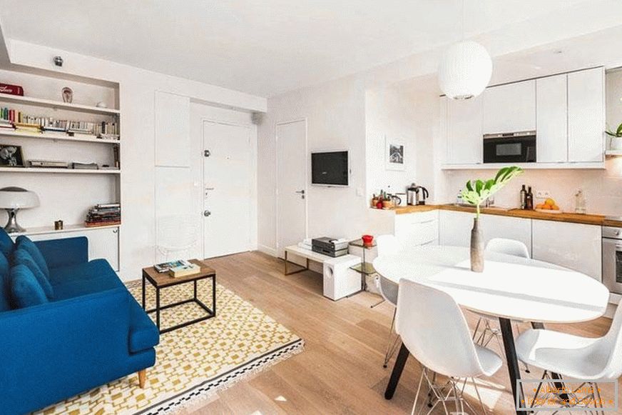 Design de cozinha com sala de estar em um quarto