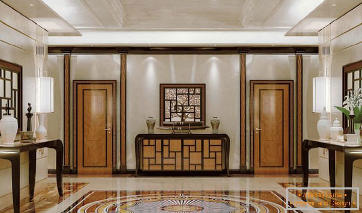 Decoração luxuosa do hall em estilo art déco com notas de clássicos. Um interior elegante e refinado, sem excesso de detalhes decorativos, parece caro e pretensioso.