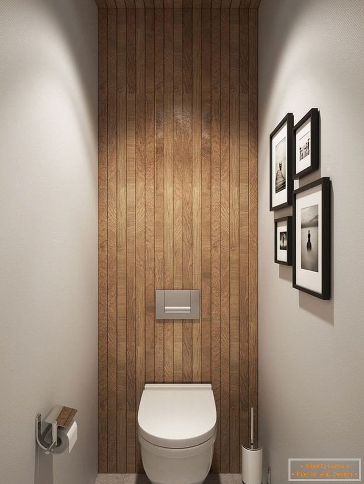 Uma casa de banho com um tecto de madeira e uma parede
