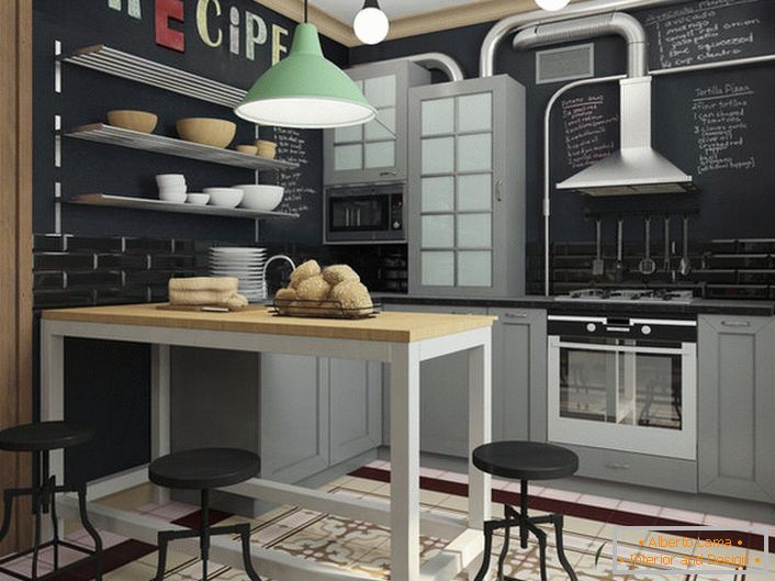 Cozinha em estilo loft em um pequeno apartamento de um designer iniciante.