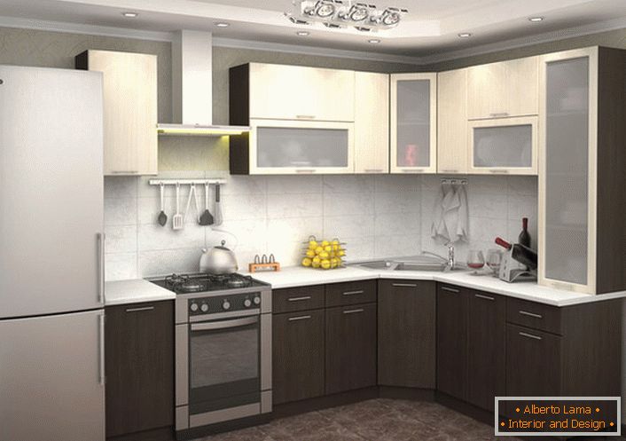 Cozinha em forma de L com muitos armários suspensos é uma solução ideal para qualquer hostess prática.