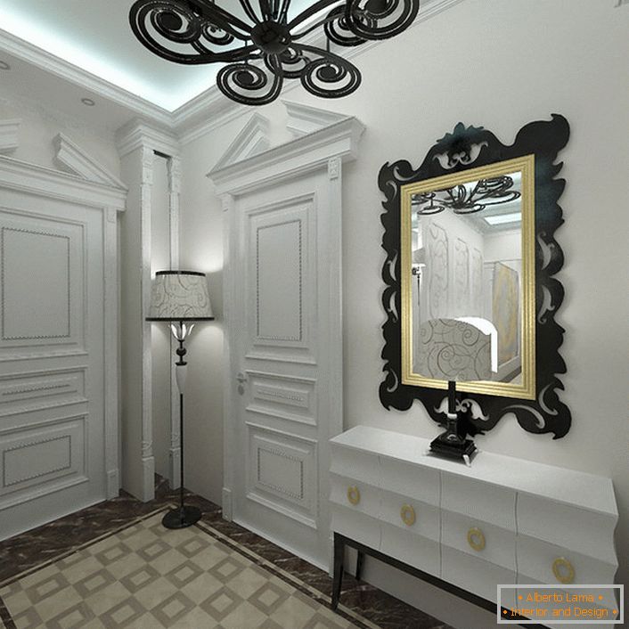 O estilo art déco gosta de tons claros no interior. A entrada, decorada em branco, é notável por elementos decorativos de contraste corretamente selecionados.