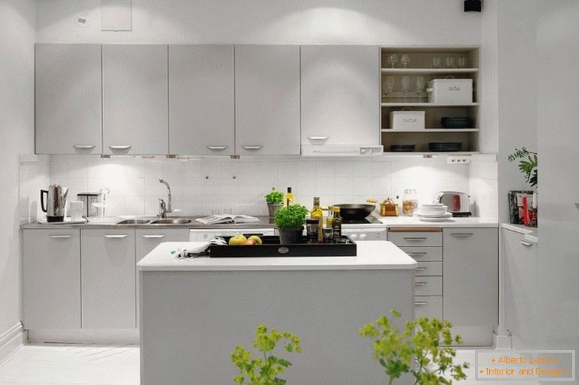Cozinha apartamento-estúdio em estilo escandinavo