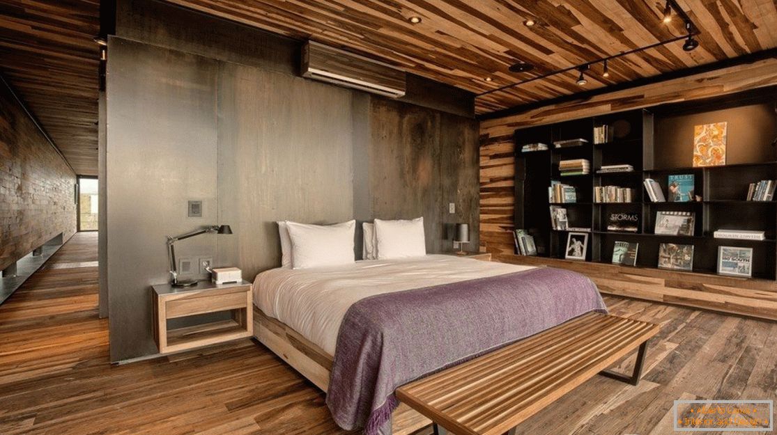 Paredes, pisos e tetos são acabados com painéis de madeira